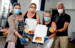 Volunteers help prepare meals for vulnerable people in Brighton