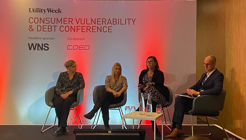 Four people sat in chairs (three women, one man) in front of a background that reads: Utility Week Consumer Vulnerability and Debt Conference 2023