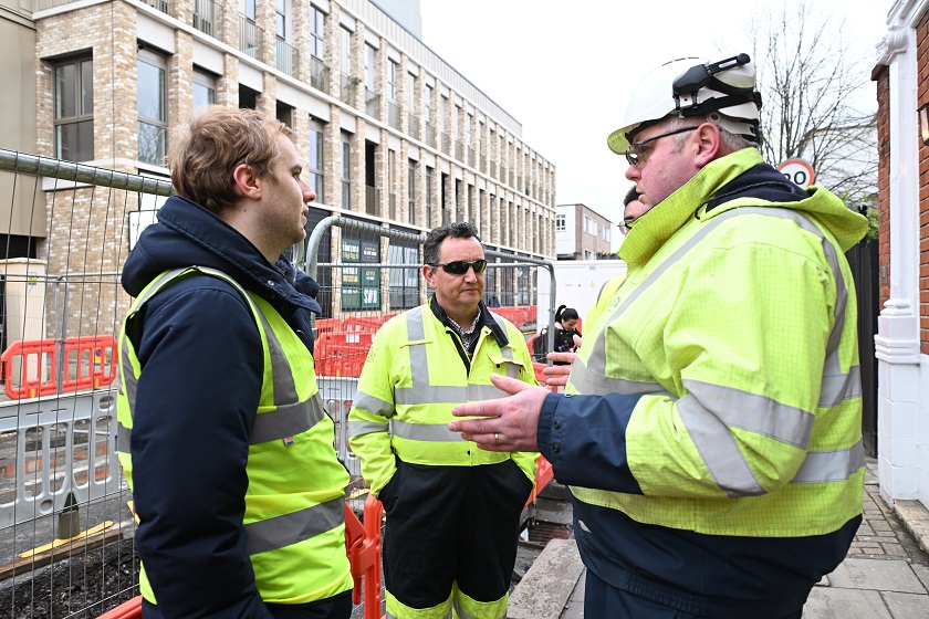 Engineers and councillors discuss work being carried out in Garratt Lane, Wandsworth