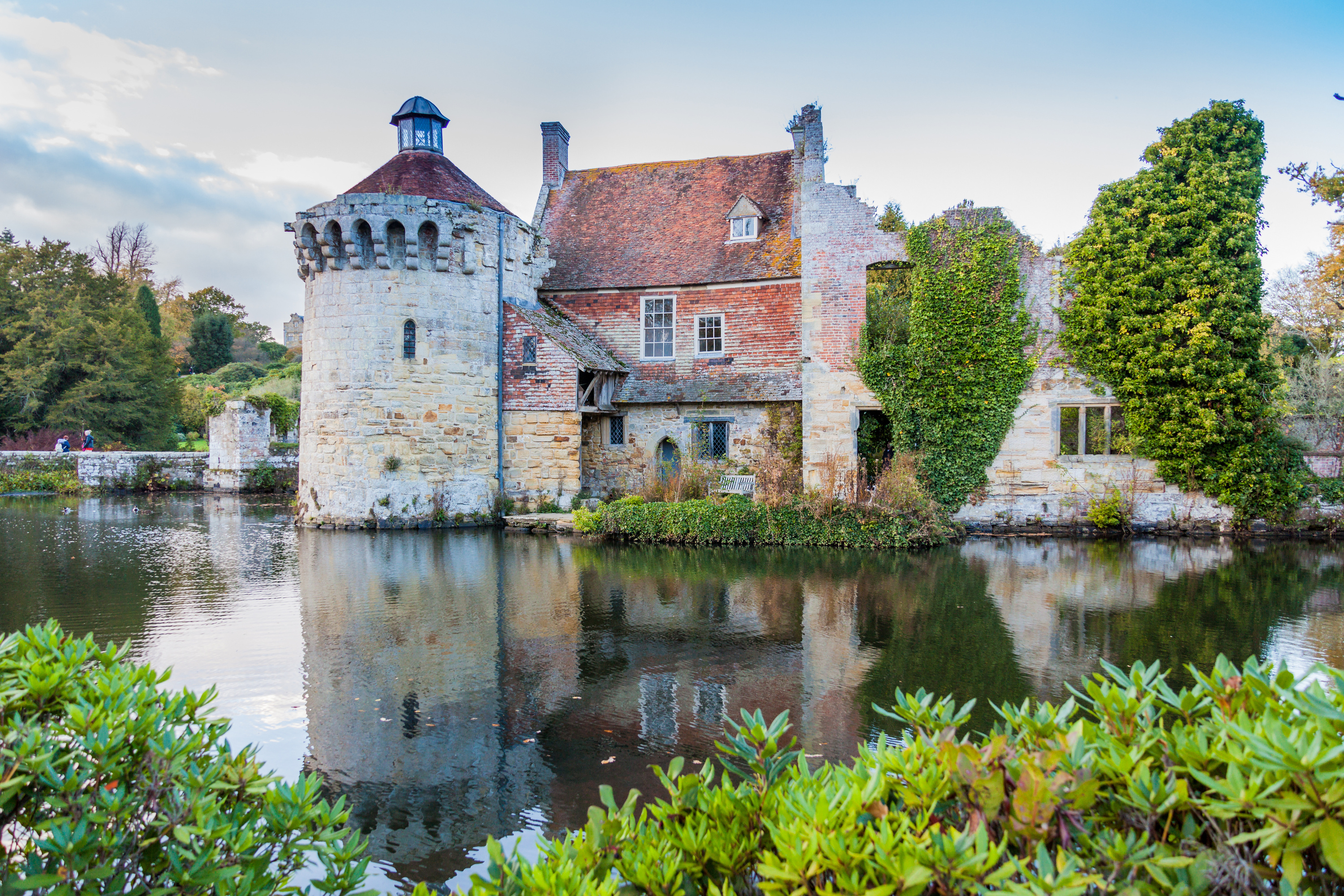 An image of Scotney Castle overlooking the water and surrounding countryside.