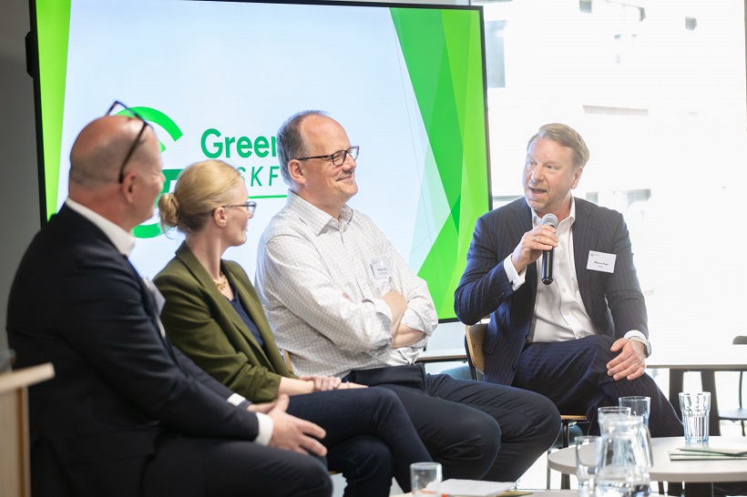 Four people at a panel during the launch of the Green Gas Taskforce. There is one woman with three men, including Marcus Hunt, our Business Development Director