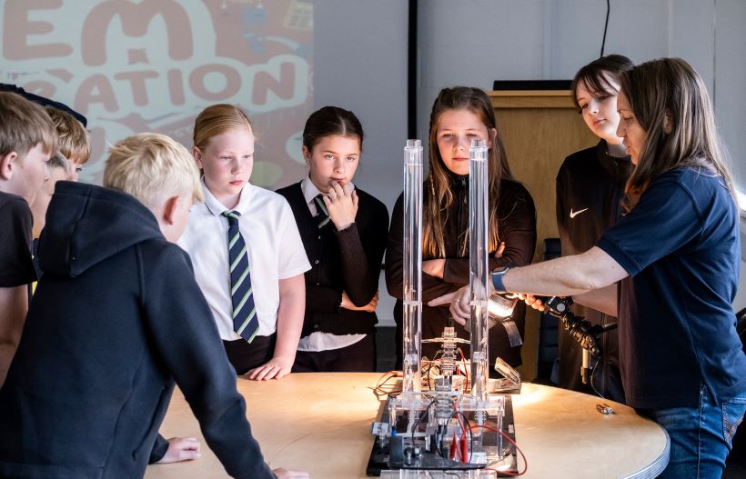Group of children learning science