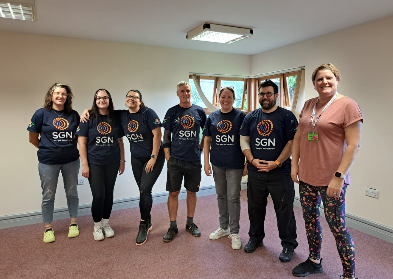 SGN colleagues with Bedhampton Community Centre Manager Hayley Gillians