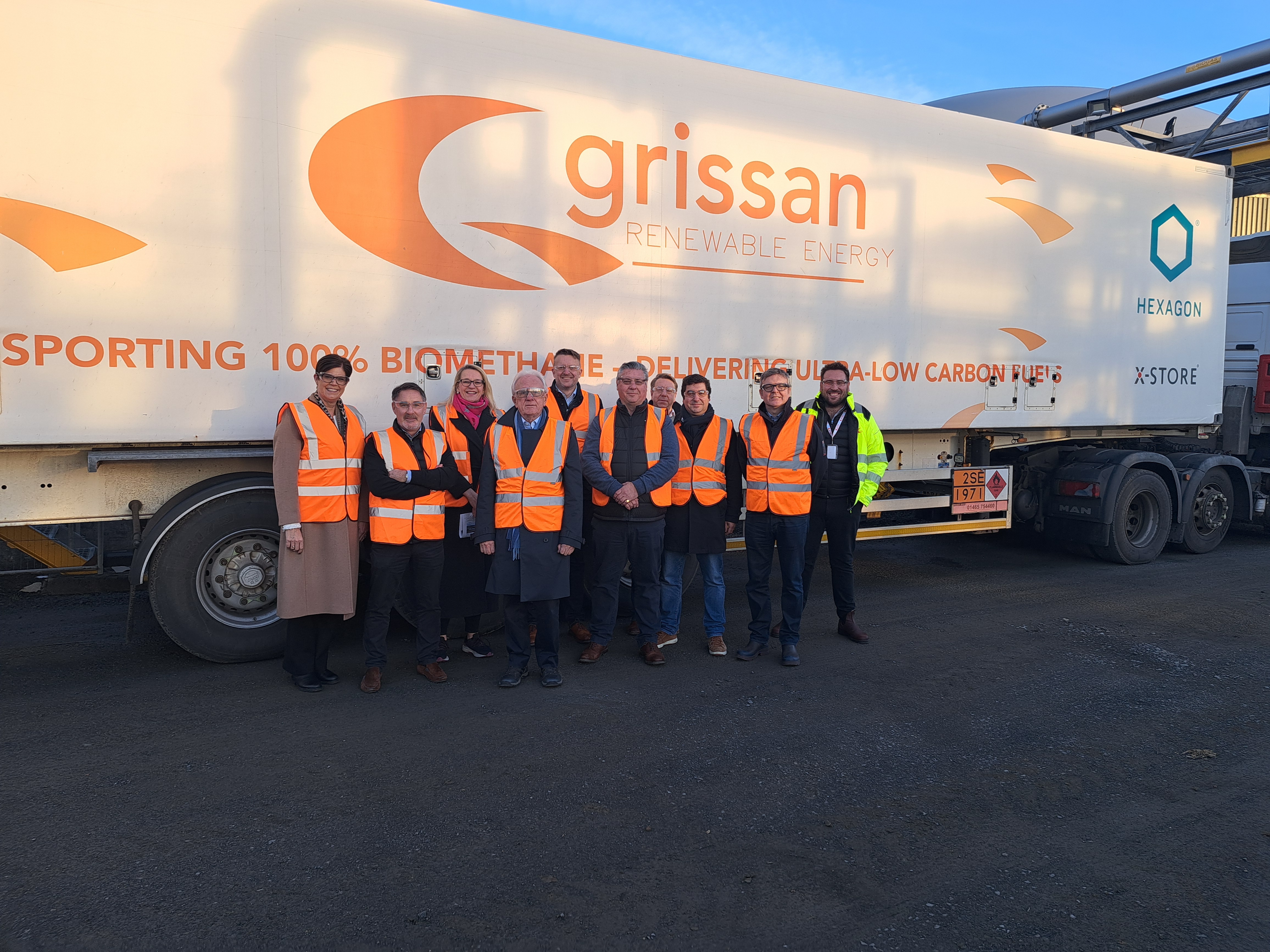 Members of SGN Board and Executive team stand in front of HGV at Grissan's Girvan site