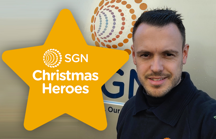 A smiling man in front of his SGN van