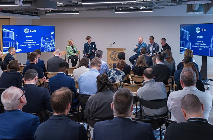 A panel discussion with an audience