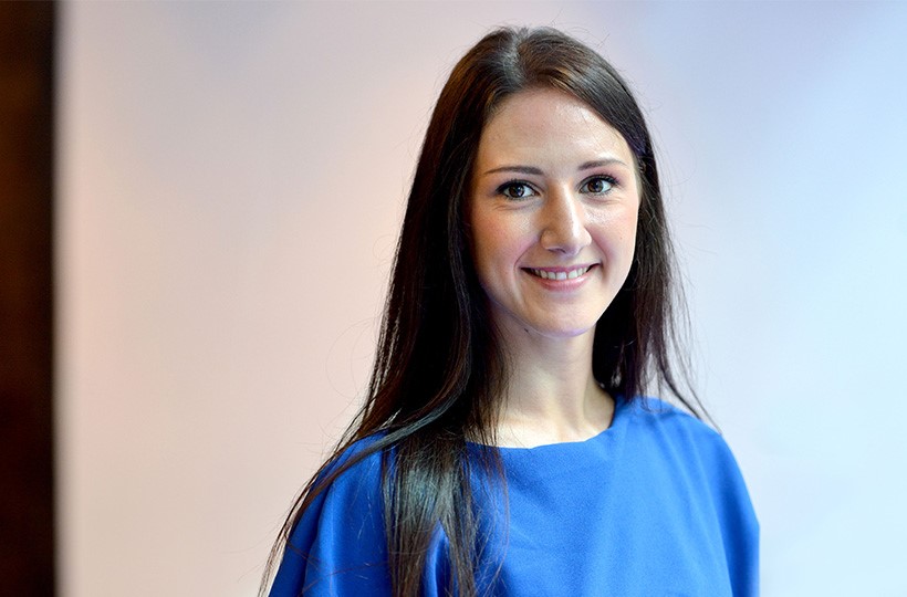 Head and shoulders of SGN female employee in business attire