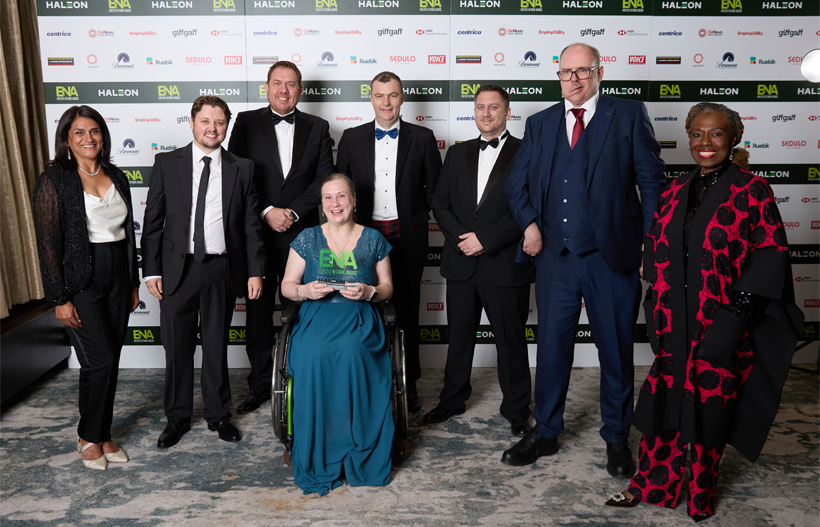 Members of our employee network Ability@SGN celebrate their double win alongside the award's presenter and sponsor