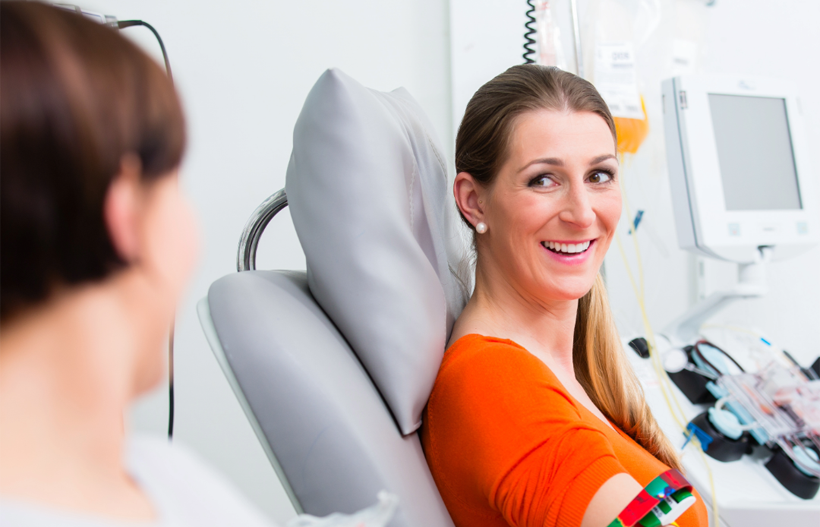A woman connected to a dialysis machine