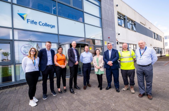 A group of people standing outside Fife College