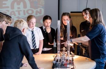 Group of children learning science