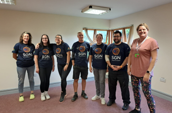 SGN colleagues with Bedhampton Community Centre Manager Hayley Gillians