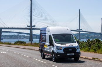 An SGN van driving alongside the Queensferry Crossing in Scotland.
